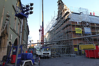 Stadtturmbild und Römermasken