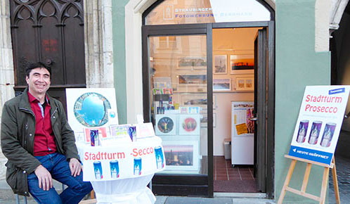 Stadtturmbild und Römermasken